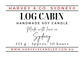 A Harvey & Co. Sydney label for an amber glass jar soy candle with smoky wood, tobacco and vanilla scent notes, shown with a lit wick