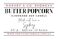 Product label for Harvey & Co. Sydney Butter Popcorn handmade soy candle, featuring red and black text on a white background with product details including weight, burn time, and website.