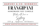 A white label for a Frangipani soy candle made by Harvey & Co. Sydney.