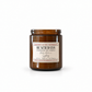 Harvey & Co. Sydney Beach Days soy candle in an amber glass jar with a cream label and red lettering.