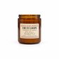 An amber glass jar candle with a cream-colored label reading 'Harvey & Co. Sydney Fruit Loops Handmade Soy Candle' on a clean white background.