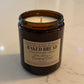 Harvey & Co. Sydney baked bread candle in a brown jar on a marble surface