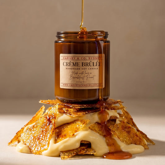 Harvey & Co. Sydney Crème Brélé candle with honey drizzle over a dessert display
