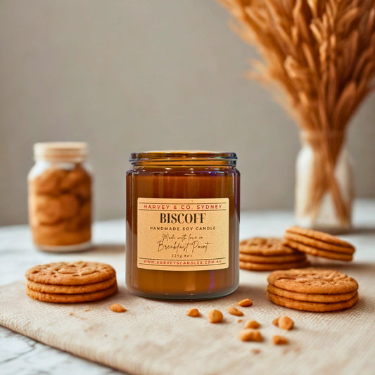 Harvey & Co. Sydney biscuit-scented candle with cookies and a vase in the background
