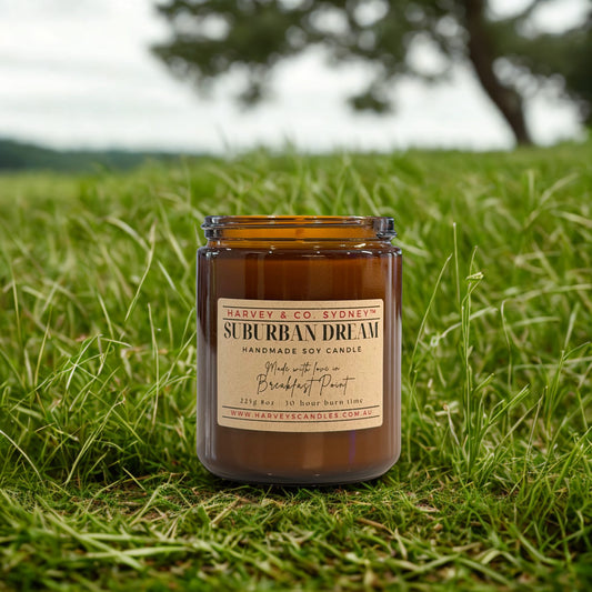 Jar of 'Suburban Dream' candle by Harvey & Co. Sydney on grass