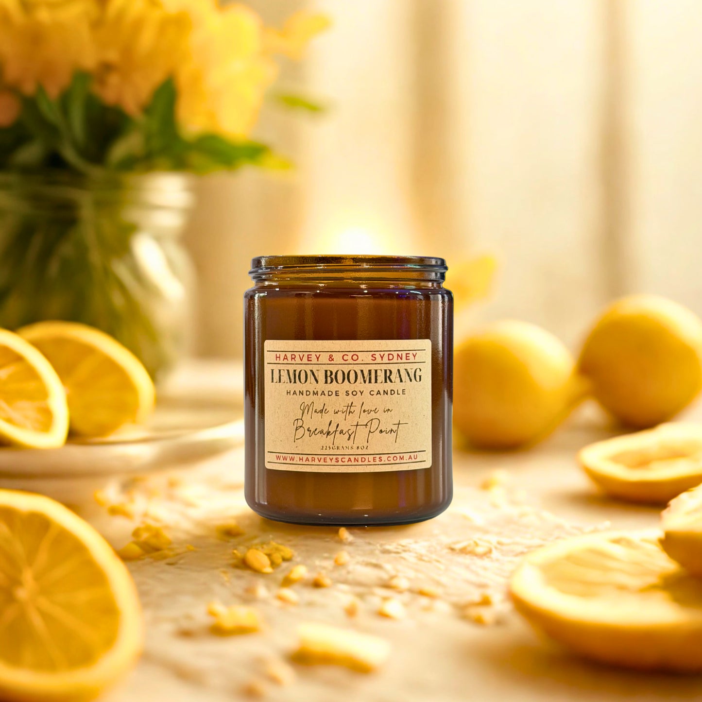 Harvey & Co. Sydney lemon candle with lemons and flowers in the background