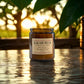 Harvey & Co. Sydney Kakadu Plum candle on a wooden surface with a blurred natural background