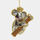 Sequined koala ornament with a crown on a white background